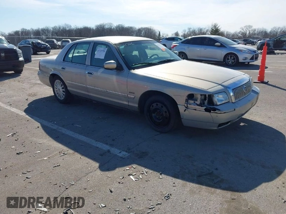 2010 Mercury Grand Marquis LS z VIN 2MEBM7FV4AX608503, wystawiony jako IAAI lot #41721726 z przebiegiem 172 907 mil mil oraz . Historia ofert i sprzedaży dostępna na DreamBid. Obrazek 1.