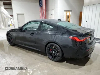2021 BMW 4 Series M440i xDrive with VIN WBA13AR0XMCG68638, listed as a Copart auction lot 52142695 with 57,299 mi miles and Salvage Title. Bid and sale history available at DreamBid. Image 2.
