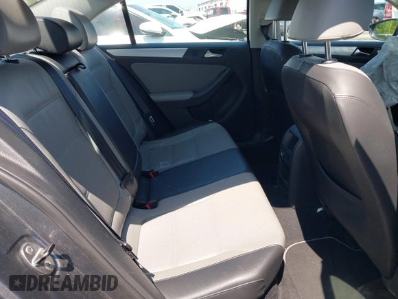 2013 Volkswagen Jetta Hybrid SE with VIN 3VW637AJ1DM232687, listed as a IAAI auction lot 41973407 with 70,428 mi miles and . Bid and sale history available at DreamBid. Image 8.