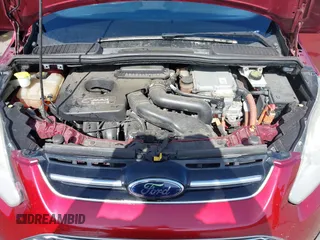 2013 Ford C-Max SEL z VIN 1FADP5CU4DL555035, wystawiony jako IAAI lot #42355498 z przebiegiem 172 374 mil mil oraz . Historia ofert i sprzedaży dostępna na DreamBid. Obrazek 10.
