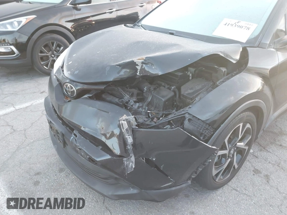 2019 Toyota C-HR XLE with VIN JTNKHMBXXK1034717, listed as a IAAI auction lot 41939078 with 56,309 mi miles. Bid and sale history available at carsss.com. Image 6.
