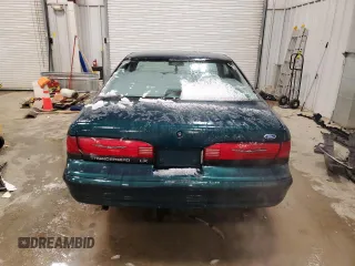 1995 Ford Thunderbird LX with VIN 1FALP62W8SH205542, listed as a Copart auction lot 47741815 with 128,401 mi miles and Clean Title. Bid and sale history available at DreamBid. Image 6.