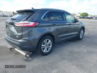 2020 Ford Edge SEL with VIN 2FMPK4J90LBA60985, listed as a IAAI auction lot 41590512 with 141,733 mi miles. Bid and sale history available at carsss.com. Image 4.