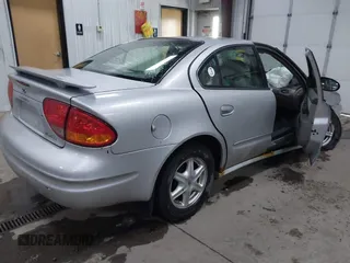 2003 Oldsmobile Alero GL1 z VIN 1G3NL52F53C112582, wystawiony jako IAAI lot #41926039 z przebiegiem 124 769 mil mil oraz . Historia ofert i sprzedaży dostępna na DreamBid. Obrazek 4.