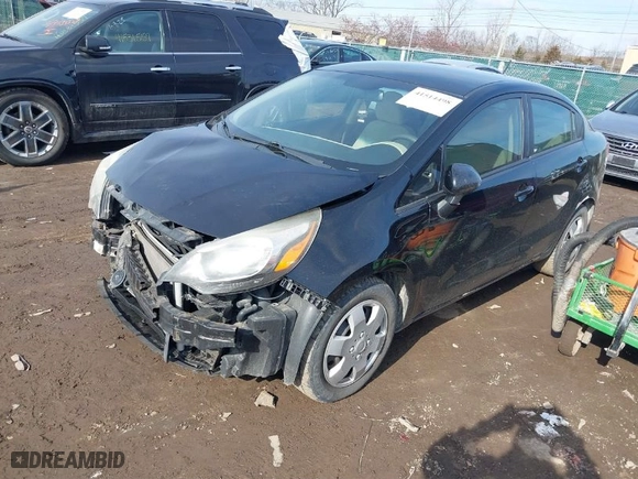2012 Kia Rio LX with VIN KNADM4A38C6072312, listed as a IAAI auction lot 41514498 with 128,307 mi miles. Bid and sale history available at carsss.com. Image 2.