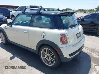 2007 MINI Hardtop S with VIN WMWMF73567TL89619, listed as a IAAI auction lot 42807828 with 201,371 mi miles and . Bid and sale history available at DreamBid. Image 3.