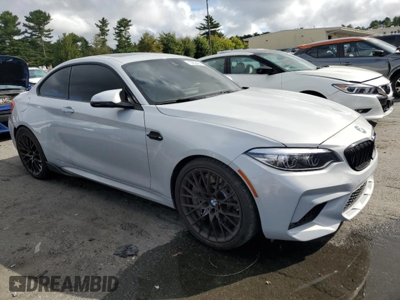 2019 BMW M2 Competition with VIN WBS2U7C51K7D09463, listed as a Copart auction lot 70858494 with 53,327 mi miles and Salvage Title. Bid and sale history available at carsss.com. Image 4.