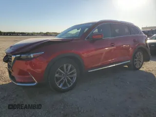 2021 Mazda CX-9 Grand Touring z VIN JM3TCADY4M0500900, wystawiony jako Copart lot #81944834 z przebiegiem 61 045 mil mil oraz Szkoda całkowita • Salvage title. Historia ofert i sprzedaży dostępna na DreamBid. Obrazek 1.