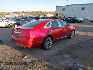 2014 Cadillac XTS Luxury with VIN 2G61M5S32E9149233, listed as a IAAI auction lot 41300177 with 60,888 mi miles. Bid and sale history available at carsss.com. Image 4.