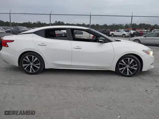 2018 Nissan Maxima SL with VIN 1N4AA6AP7JC371792, listed as a IAAI auction lot 41285671 with 137,517 mi miles. Bid and sale history available at carsss.com. Image 13.
