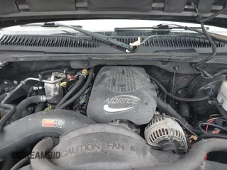 2002 Chevrolet Suburban LS with VIN 3GNEC16Z42G281945, listed as a IAAI auction lot 41419037 with 203,928 mi miles. Bid and sale history available at carsss.com. Image 10.