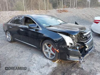 2017 Cadillac XTS Luxury with VIN 2G61M5S30H9159277, listed as a IAAI auction lot 41225371 with 125,523 mi miles. Bid and sale history available at carsss.com. Image 1.