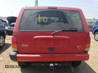 1999 Jeep Cherokee Sport z VIN 1J4FF68SXXL662401, wystawiony jako Copart lot #59698565 z przebiegiem Nie podano mil oraz Szkoda całkowita • Salvage title. Historia ofert i sprzedaży dostępna na DreamBid. Obrazek 6.