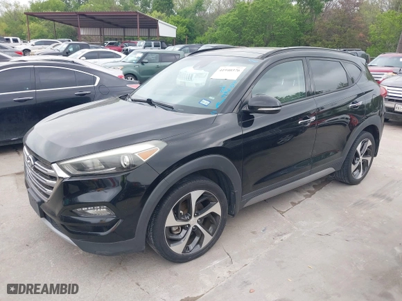 2017 Hyundai Tucson Value with VIN KM8J33A26HU362363, listed as a IAAI auction lot 41940376 with 127,986 mi miles. Bid and sale history available at carsss.com. Image 20.
