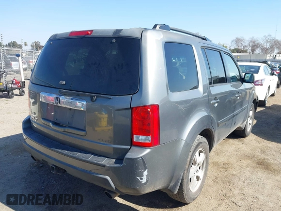 2009 Honda Pilot EX with VIN 5FNYF48439B036957, listed as a IAAI auction lot 41656284 with 199,115 mi miles. Bid and sale history available at carsss.com. Image 4.