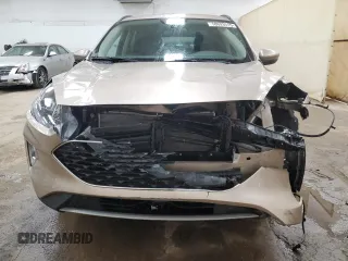 2020 Ford Escape SEL z VIN 1FMCU9H64LUC28297, wystawiony jako Copart lot #58693515 z przebiegiem 57 038 mil mil oraz Szkoda całkowita • Salvage title. Historia ofert i sprzedaży dostępna na DreamBid. Obrazek 5.