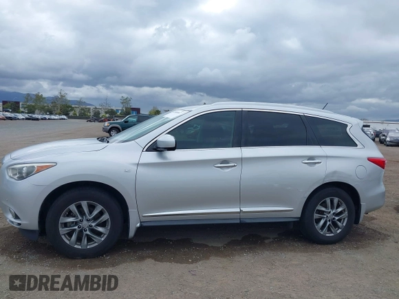 2015 Infiniti QX60 with VIN 5N1AL0MM3FC503873, listed as a IAAI auction lot 42080667 with 203,752 mi miles. Bid and sale history available at carsss.com. Image 6.