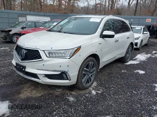 2019 Acura MDX Sport Hybrid w/Advance Pkg with VIN 5J8YD7H77KL000596, listed as a IAAI auction lot 41540974 with 89,378 mi miles. Bid and sale history available at carsss.com. Image 2.
