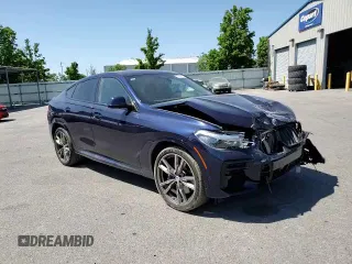 2023 BMW X6 M50i with VIN 5UXCY8C09P9P28422, listed as a Copart auction lot 52818133 with 4,131 mi miles and Salvage Title. Bid and sale history available at carsss.com. Image 11.