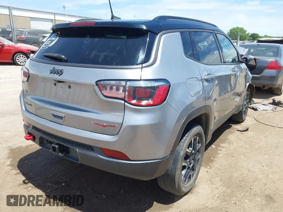 2020 Jeep Compass Trailhawk with VIN 3C4NJDDB7LT159532, listed as a IAAI auction lot 42243833 with 118,566 mi miles and . Bid and sale history available at DreamBid. Image 4.