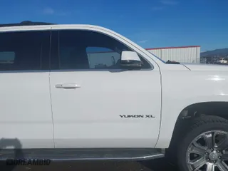 2017 GMC Yukon XL SLT with VIN 1GKS2GKC5HR153908, listed as a IAAI auction lot 41680710 with 143,195 mi miles. Bid and sale history available at carsss.com. Image 13.