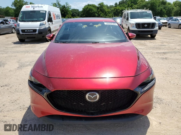 2021 Mazda 3 Premium with VIN JM1BPAML4M1317178, listed as a Copart auction lot 56008305 with 104,380 mi miles and Salvage title. Bid and sale history available at DreamBid. Image 5.