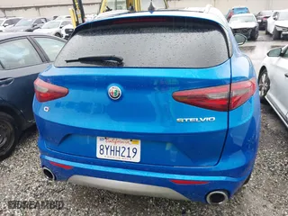 2021 Alfa Romeo Stelvio Ti with VIN ZASPAKBN0M7D18611, listed as a IAAI auction lot 41104626 with 30,188 mi miles. Bid and sale history available at carsss.com. Image 16.