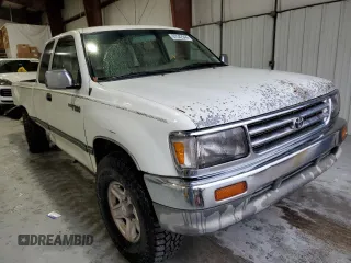 1997 Toyota T100 SR5 with VIN JT4UN24D9V0048079, listed as a Copart auction lot 87042344 with 303,785 mi miles and Salvage Title. Bid and sale history available at DreamBid. Image 4.