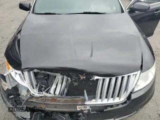 2012 Lincoln MKS with VIN 1LNHL9ER3CG806878, listed as a Copart auction lot 87162644 with 136,878 mi miles and Salvage Title. Bid and sale history available at DreamBid. Image 11.
