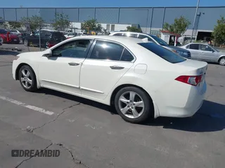 2009 Acura TSX with VIN JH4CU26629C003923, listed as a IAAI auction lot 42488628 with 213,331 mi miles and . Bid and sale history available at DreamBid. Image 3.