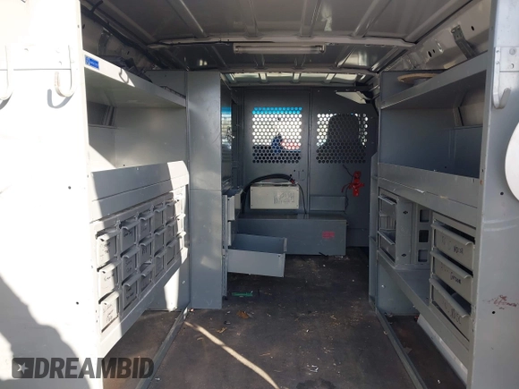 2009 Ford Econoline Cargo with VIN 1FTNE24L79DA86615, listed as a IAAI auction lot 41969289 with 158,267 mi miles and . Bid and sale history available at DreamBid. Image 13.