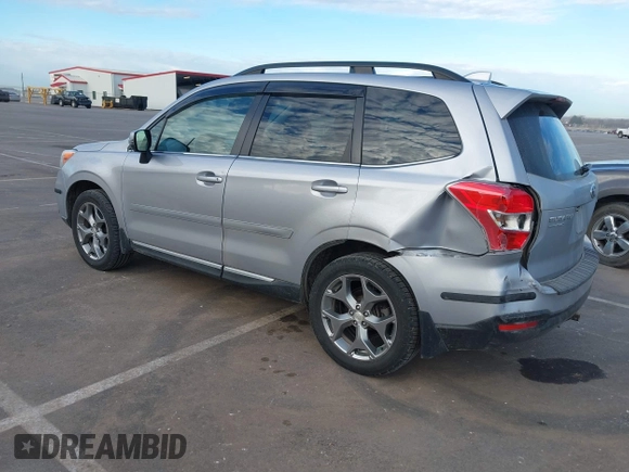 2016 Subaru Forester 2.5i Touring with VIN JF2SJAXC7GH455601, listed as a IAAI auction lot 41876613 with 133,976 mi miles. Bid and sale history available at carsss.com. Image 3.