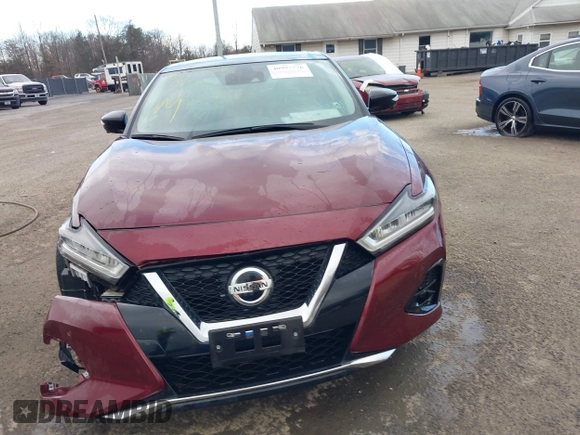 2020 Nissan Maxima Platinum with VIN 1N4AA6FV1LC377694, listed as a IAAI auction lot 40997776 with 14,321 mi miles and . Bid and sale history available at DreamBid. Image 12.
