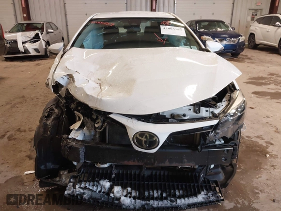 2019 Toyota Corolla L with VIN 2T1BURHE3KC132647, listed as a IAAI auction lot 42005289 with 34,077 mi miles and . Bid and sale history available at DreamBid. Image 6.