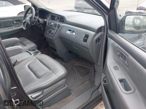 2004 Honda Odyssey EX-L with VIN 5FNRL18064B066763, listed as a IAAI auction lot 42588622 with 499,993 mi miles and . Bid and sale history available at DreamBid. Image 5.