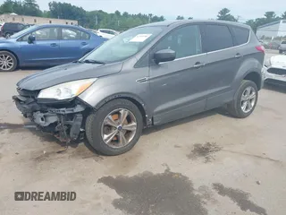 2014 Ford Escape SE with VIN 1FMCU9G97EUB27835, listed as a IAAI auction lot 42530986 with 137,933 mi miles and . Bid and sale history available at DreamBid. Image 2.