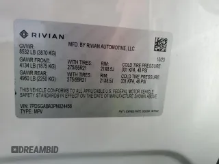 2023 Rivian R1S Adventure z VIN 7PDSGABA3PN024458, wystawiony jako Copart lot #74087714 z przebiegiem 3 505 mil mil oraz Nie do naprawy • Non repairable. Historia ofert i sprzedaży dostępna na DreamBid. Obrazek 14.
