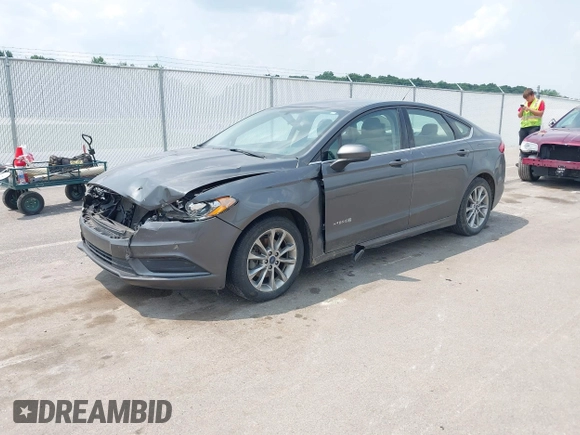 2017 Ford Fusion Hybrid SE with VIN 3FA6P0LUXHR279771, listed as a IAAI auction lot 42417831 with 189,493 mi miles and . Bid and sale history available at DreamBid. Image 2.