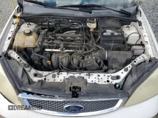 2007 Ford Focus S with VIN 1FAHP34N27W229136, listed as a Copart auction lot 52704755 with 322,968 mi miles and Salvage Title. Bid and sale history available at carsss.com. Image 11.