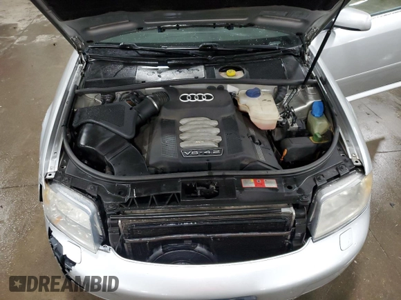 2002 Audi A6 z VIN WAUML64B42N115811, wystawiony jako Copart lot #53707795 z przebiegiem 200 257 mil mil oraz Szkoda całkowita • Salvage title. Historia ofert i sprzedaży dostępna na DreamBid. Obrazek 11.