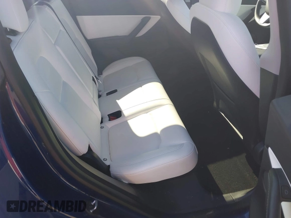 2021 Tesla Model Y Long Range with VIN 5YJYGDEE8MF293230, listed as a IAAI auction lot 41744033 with 56,797 mi miles and . Bid and sale history available at DreamBid. Image 8.