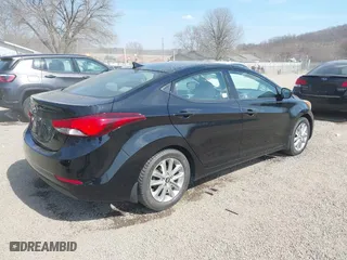 2014 Hyundai Elantra SE with VIN KMHDH4AE5EU101798, listed as a IAAI auction lot 41785753 with 206,799 mi miles. Bid and sale history available at carsss.com. Image 4.