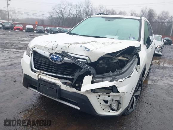 2019 Subaru Forester Touring with VIN JF2SKAWC3KH555900, listed as a IAAI auction lot 41558281 with 138,351 mi miles. Bid and sale history available at carsss.com. Image 6.