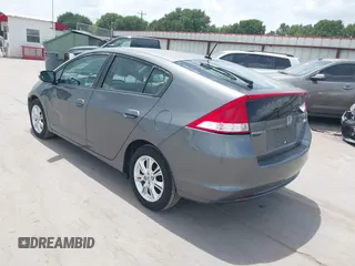 2010 Honda Insight EX with VIN JHMZE2H74AS040110, listed as a IAAI auction lot 42643669 with 189,531 mi miles and . Bid and sale history available at DreamBid. Image 3.