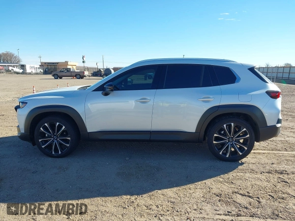 2024 Mazda CX-50 Premium z VIN 7MMVABDY0RN186511, wystawiony jako IAAI lot #41229255 z przebiegiem 21 842 mil mil oraz . Historia ofert i sprzedaży dostępna na DreamBid. Obrazek 14.