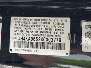 2004 Acura RL w/Navigation System with VIN JH4KA96624C003779, listed as a IAAI auction lot 39542033 with 80,018 mi miles. Bid and sale history available at carsss.com. Image 9.