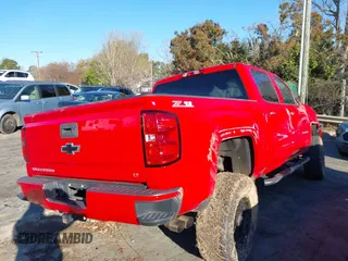2018 Chevrolet Silverado 1500 LT with VIN 3GCUKREC7JG359913, listed as a IAAI auction lot 41848404 with 125,377 mi miles. Bid and sale history available at carsss.com. Image 4.