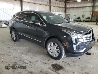 2019 Cadillac XT5 AWD with VIN 1GYKNBRS3KZ123097, listed as a Copart auction lot 58726525 with 53,324 mi miles and Salvage title. Bid and sale history available at DreamBid. Image 4.