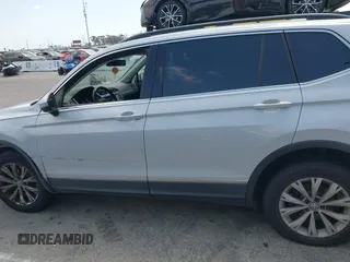 2018 Volkswagen Tiguan SEL with VIN 3VV2B7AX8JM105246, listed as a IAAI auction lot 41906838 with 110,749 mi miles and . Bid and sale history available at DreamBid. Image 14.
