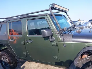 2007 Jeep Wrangler Unlimited X с VIN 1J4GA39197L115109, выставлен на аукционе IAAI как лот 42582190 с пробегом 141 080 миль миль и . История ставок и продаж доступна на DreamBid. Изображение 13.
